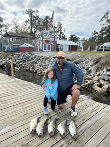 Three fishing rods with 3 fish caught in SC