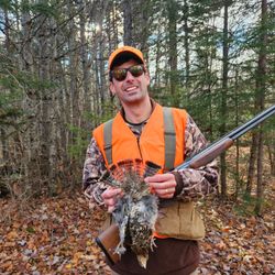 A lone angler enjoying a fishing expedition in Maine