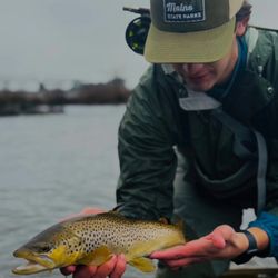 Fisherman in Maine enjoying a day of fishing and hunting