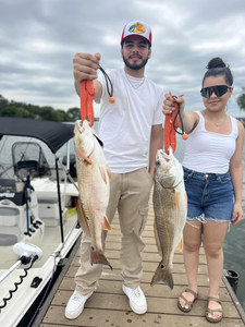 Pair of anglers with 2 big fish on the TX shore