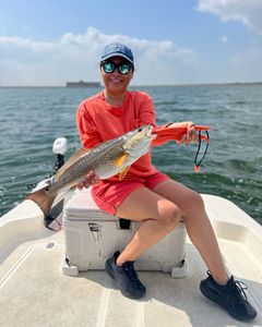 A redfish caught by a fisherman in TX