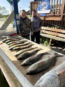Two anglers fishing in Port Mansfield