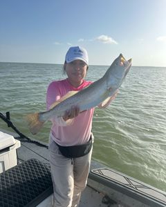A lone angler fishing in Port Mansfield