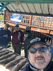 A group of 3 people fishing in Port Mansfield