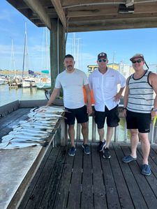 Three people fishing in TX