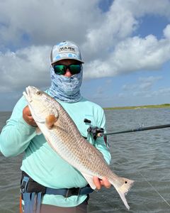 A person enjoying fishing in TX