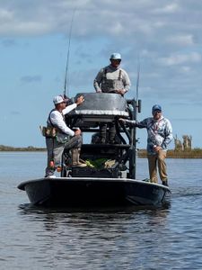 Three people fishing at Rockport