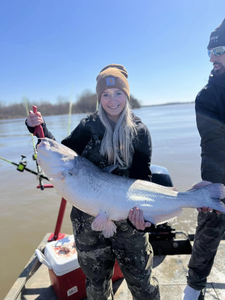 A photo of two people fishing in VA with a big 31-inch fish