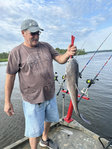 A single fisherman posing for a photo at Rappahannock Academy