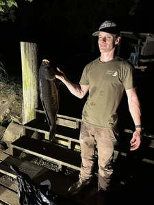 An angler with a 24-inch fish caught in VA