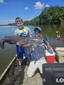 A group of three people fishing in VA
