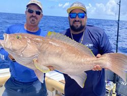 A group of two people fishing in Riviera Beach