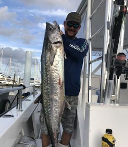 A fishing enthusiast with a king mackerel catch in Riviera Beach