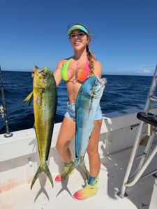 Angler holding two fish in FL