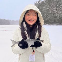 A person fishing in NY
