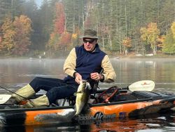 Angler fishing in Paul Smiths