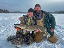 Ice fishing success with large Northern Pike caught in Paul Smiths NY winter conditions