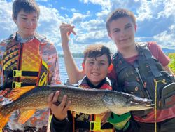 Northern Pike being caught while fishing in Paul Smiths
