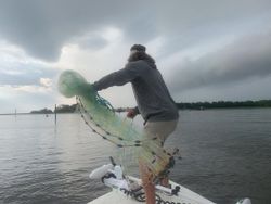 Scenic view of Wilmington skyline, fishing rods in foreground