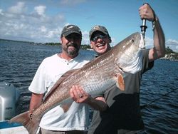 Two anglers fishing in Florida with fishing rods