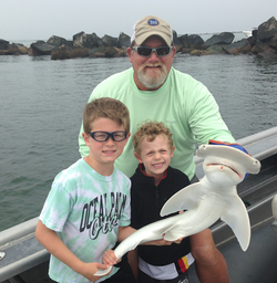 A group of people fishing for bonnethead shark in Jacksonville