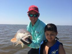 Anglers with one small fish in Georgia