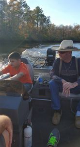 Two people fishing in GA