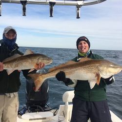 Two redfish caught during a fishing trip in Brunswick