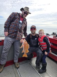 A group of 3 people fishing in OR