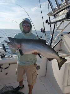 Angler with a big fish in Algoma