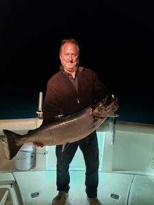Coho salmon caught by angler in Algoma