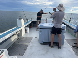 A person fishing at Virginia Beach