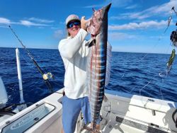 Angler holds a 45-inch fish in St. Augustine