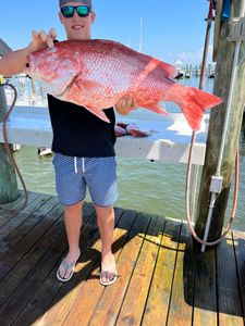 Angler with 29-inch fish on the water in AL