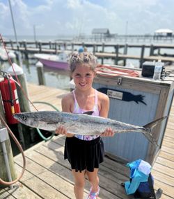 King mackerel catch displayed on fishing dock in Gulf Shores AL