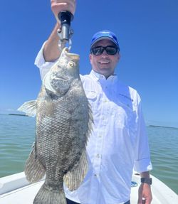 A person fishing in FL