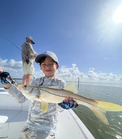 A snook fish caught during a fishing trip in Tavernier