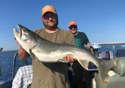 Anglers with a big fish in MN