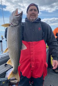 A lone angler fishing for a lake trout in Duluth