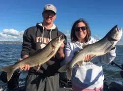 Two lake trout, 25 inches long, caught while fishing in MN