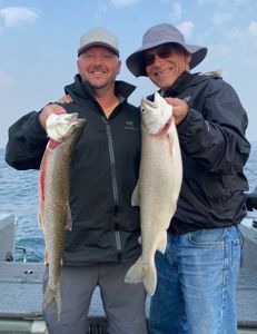 Two anglers fishing in Minnesota with 2 fish caught