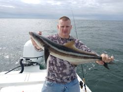 Cobia catch displayed on fishing boat in Port Orange FL waters