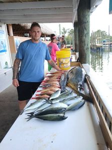 Fresh caught fish displayed on cleaning table at fishing dock in Port Orange Florida