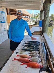 Fishing catch display showing lane snapper and blue runner from Port Orange FL fishing tour