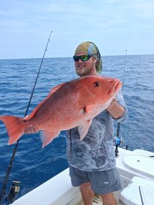 Red snapper catch during fishing charter trip in Port Orange FL
