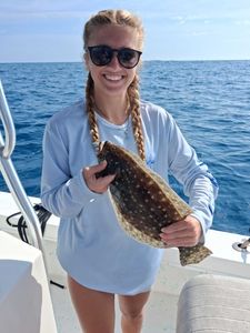 Summer flounder caught during fishing charter in Port Orange FL