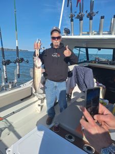 A person fishing for a walleye in OH