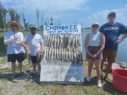 Four people enjoying a great fishing trip at Lakeside Marblehead