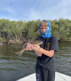 Nice catch with a lively Redfish on the flats!
