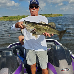 Angler with a Florida Bass fish in FL